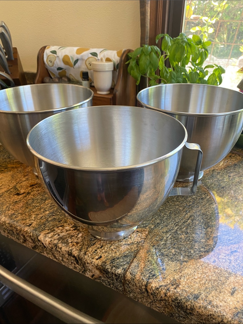 Three Kitchen Aid Stainless Steel Mixing Bowls (one with handle)